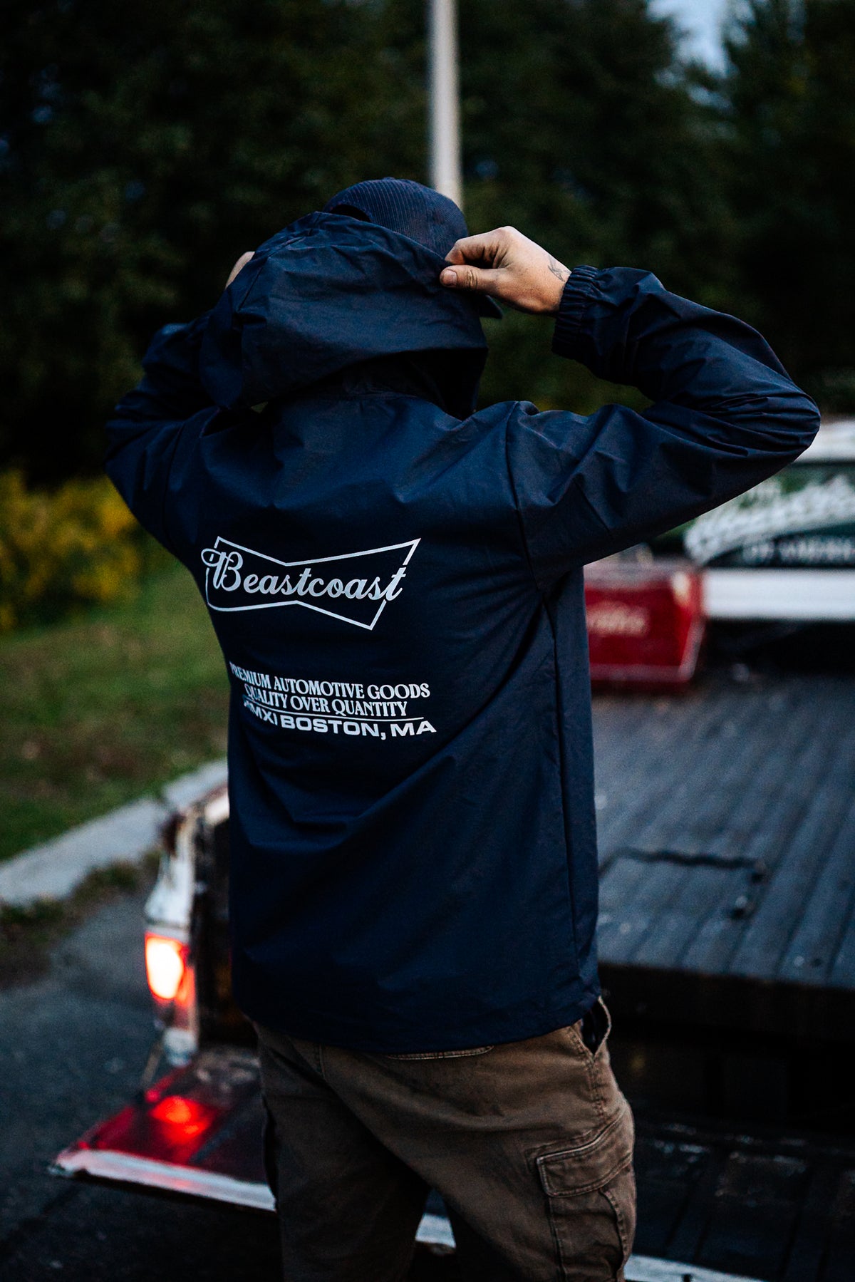 BeastCoast Americana Breaker jacket in navy, back view with bowtie logo