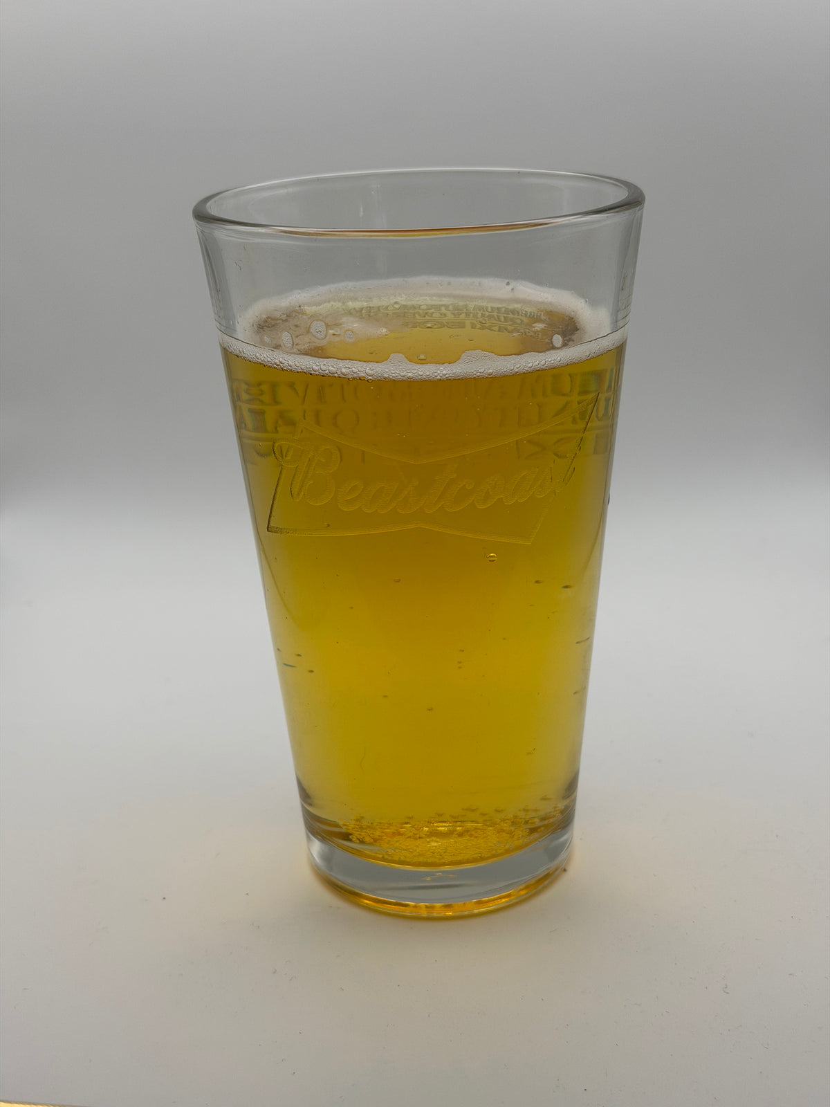 BeastCoast Americana Pint glass with beer, alternate angle