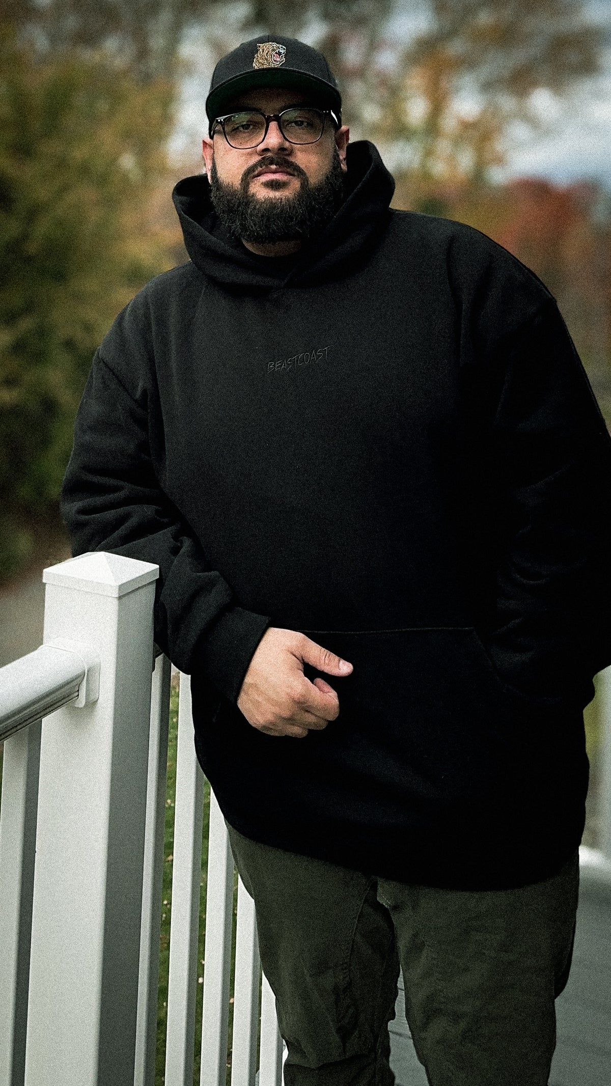 BeastCoast Minimalist Hoodie in black, front view on model